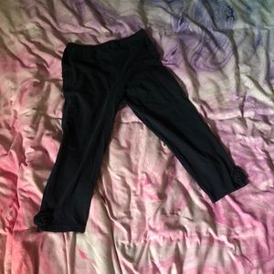 Navy blue leggings with little flowers at the end